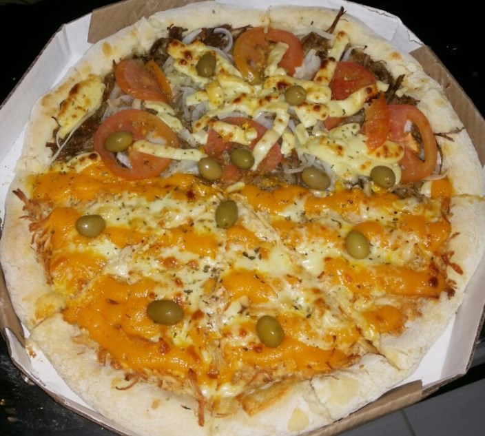 Qualquer pizza grande do cardápio no Quintal Paulista